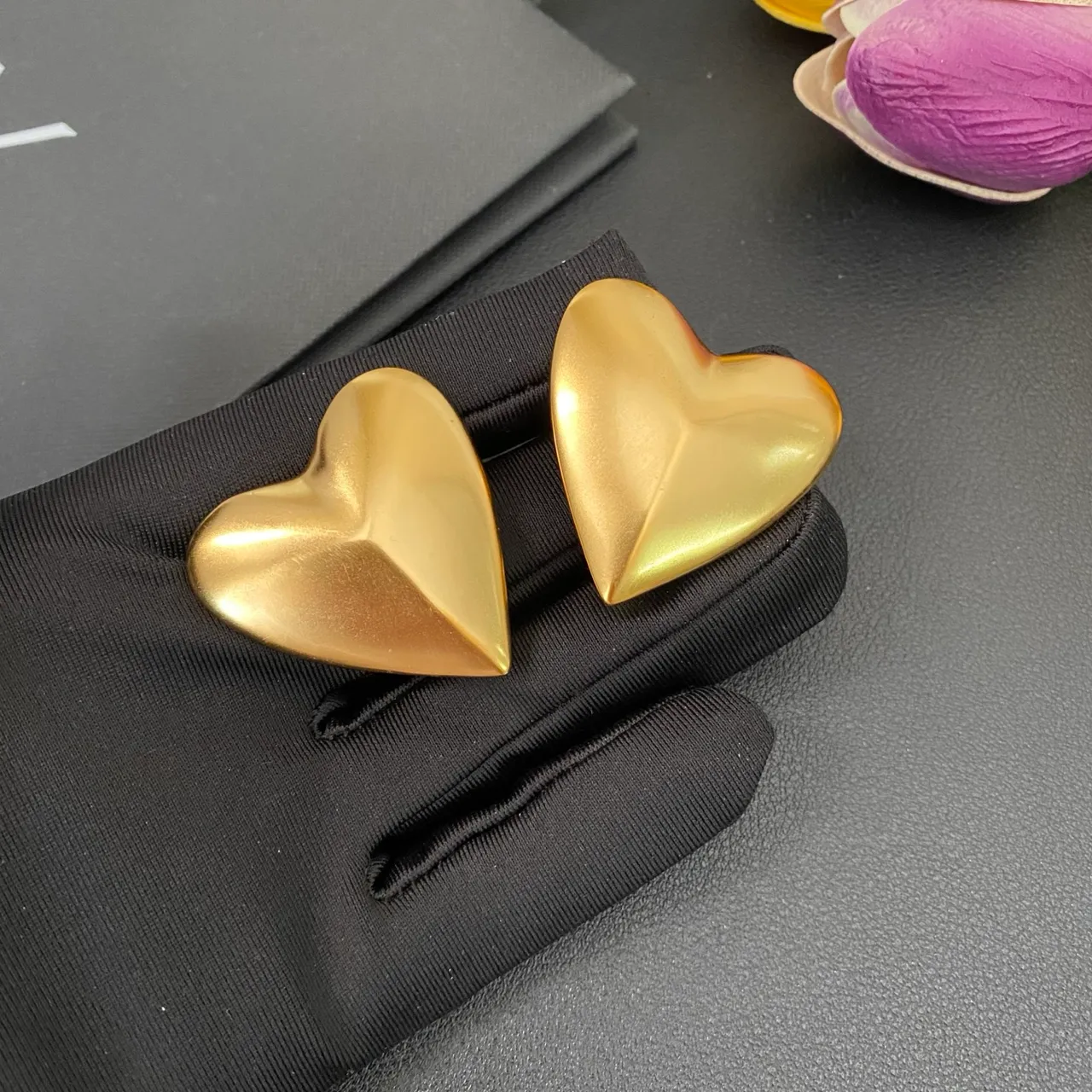 Saint Laurent Gold Sculpted Heart Metallic Earrings