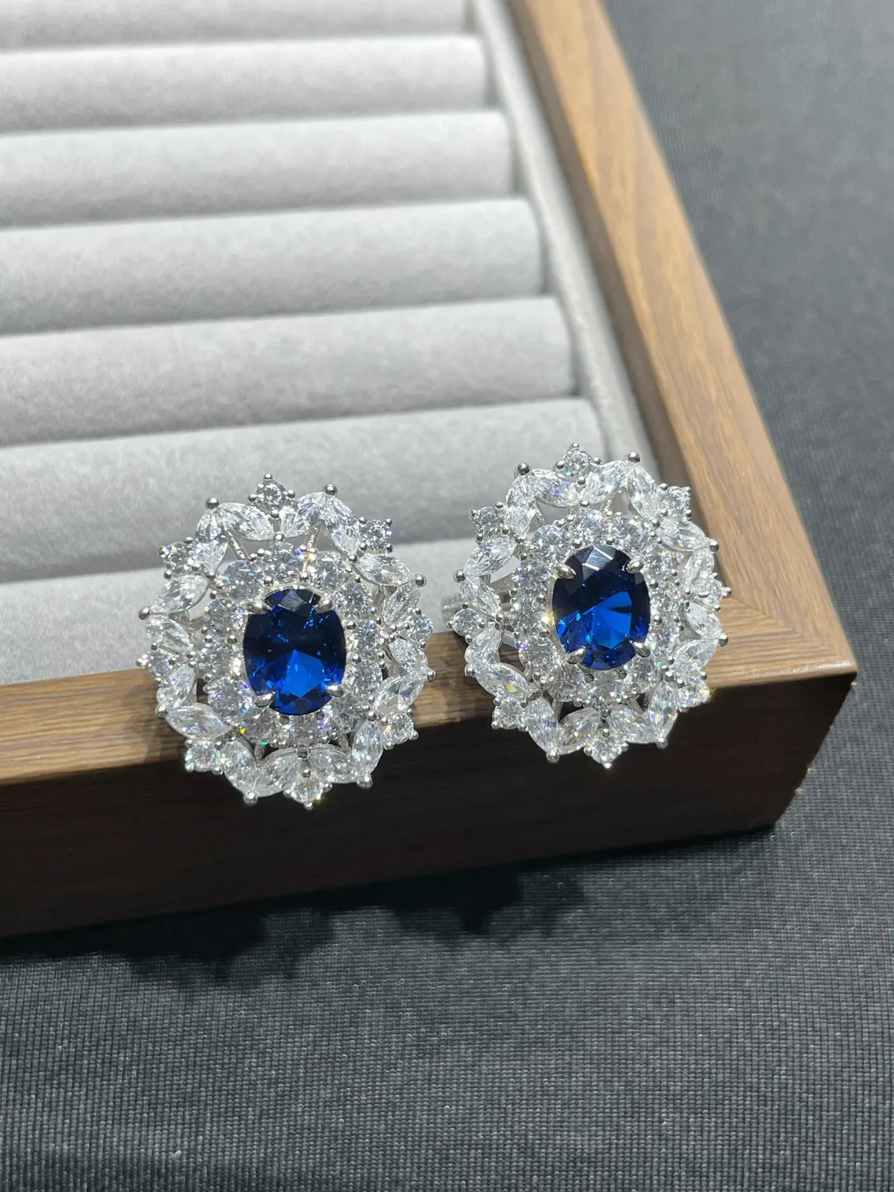 Oval Blue Gem Halo Stud Earrings
