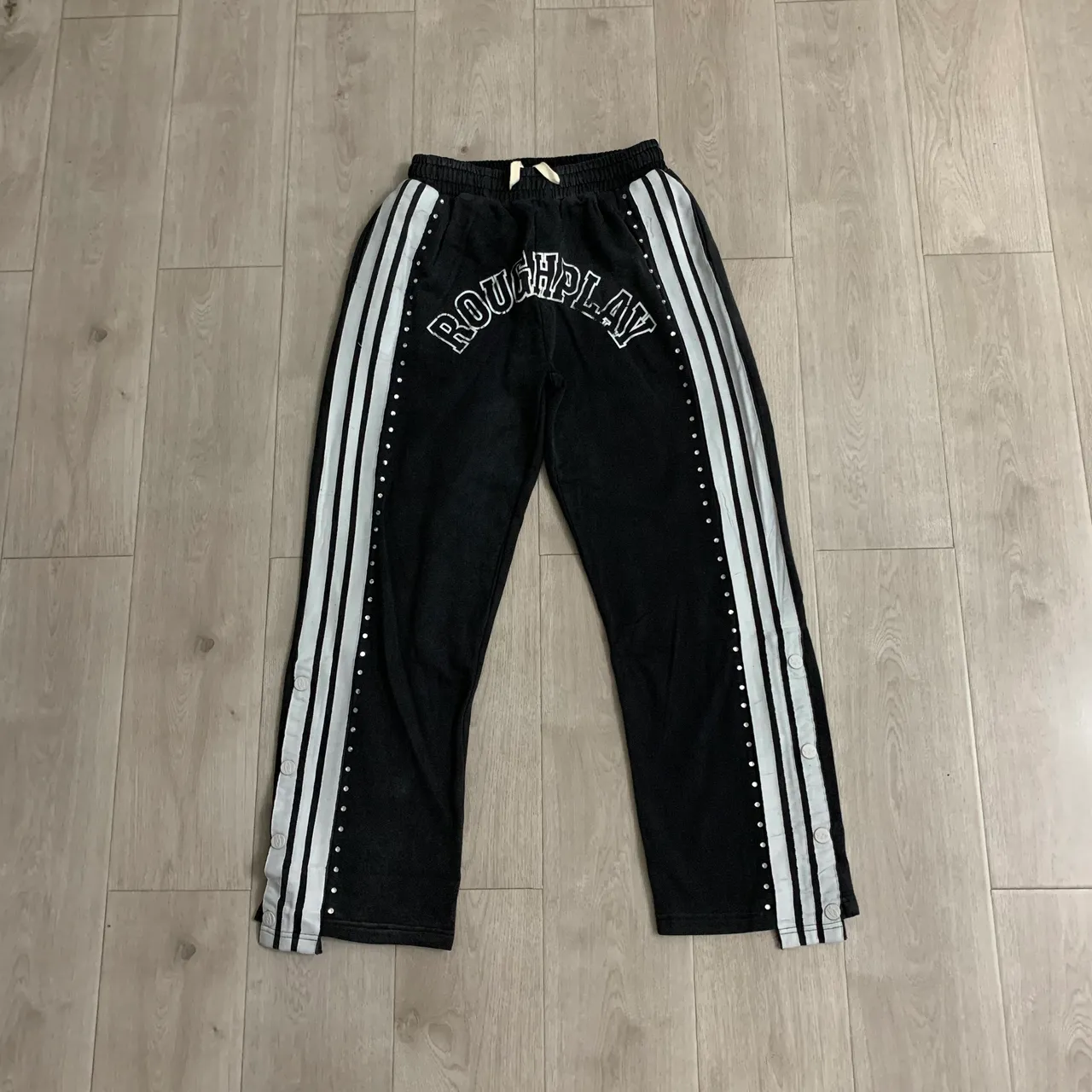 Roughplay Arch Logo Studded Stripe Sweatpants