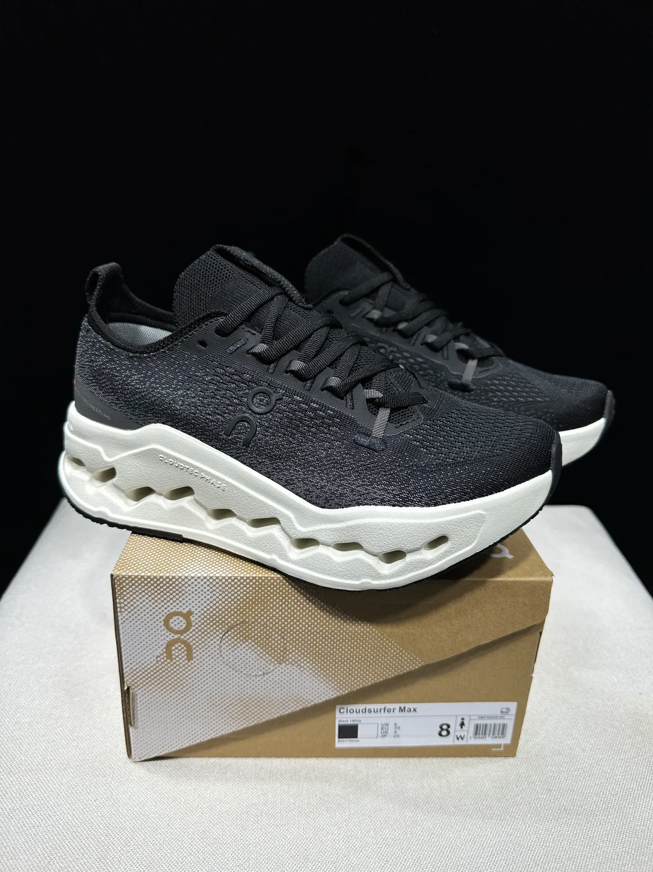 On Cloudmonster Black and Off-White Running Shoes