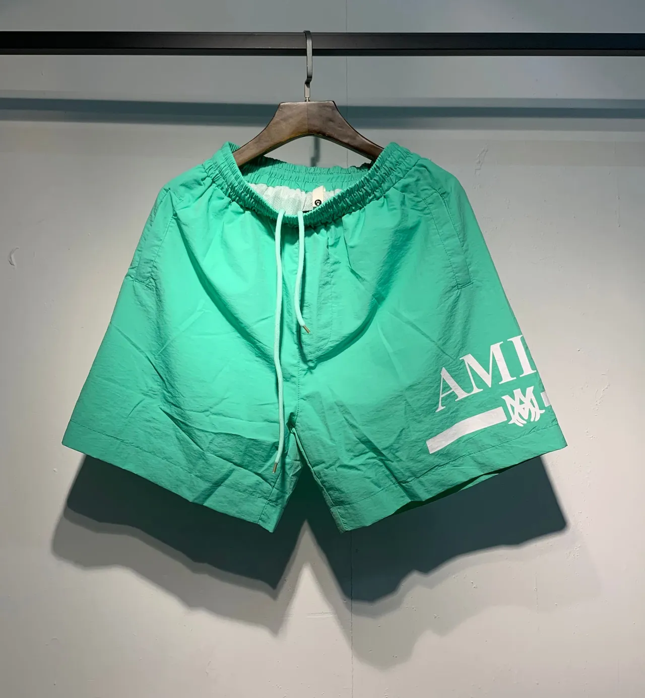 AMI Paris Black Green Lightweight Synthetic Fabric Side Logo Print Shorts