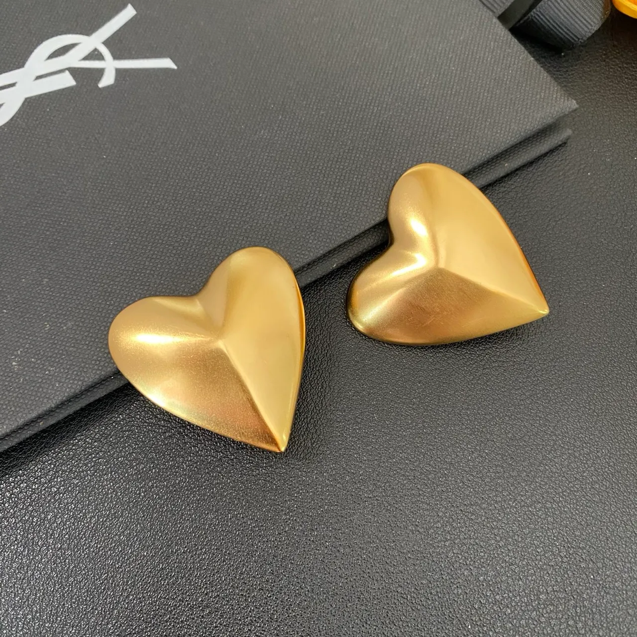 Saint Laurent Gold Sculpted Heart Metallic Earrings
