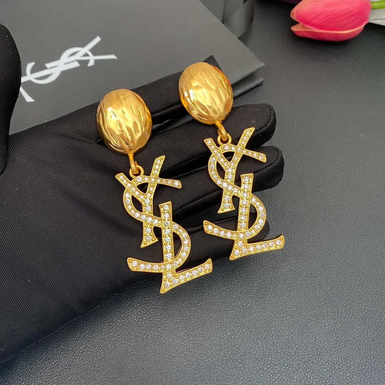 Saint Laurent YSL Monogram Pavé Crystal Gold Dangling Earrings