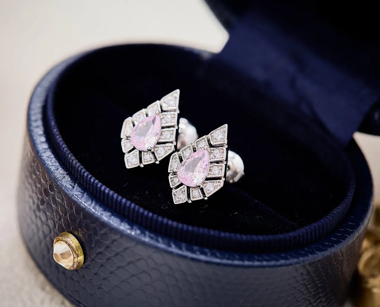Pear-Shaped Pink Gemstone Geometric Halo Stud Earrings
