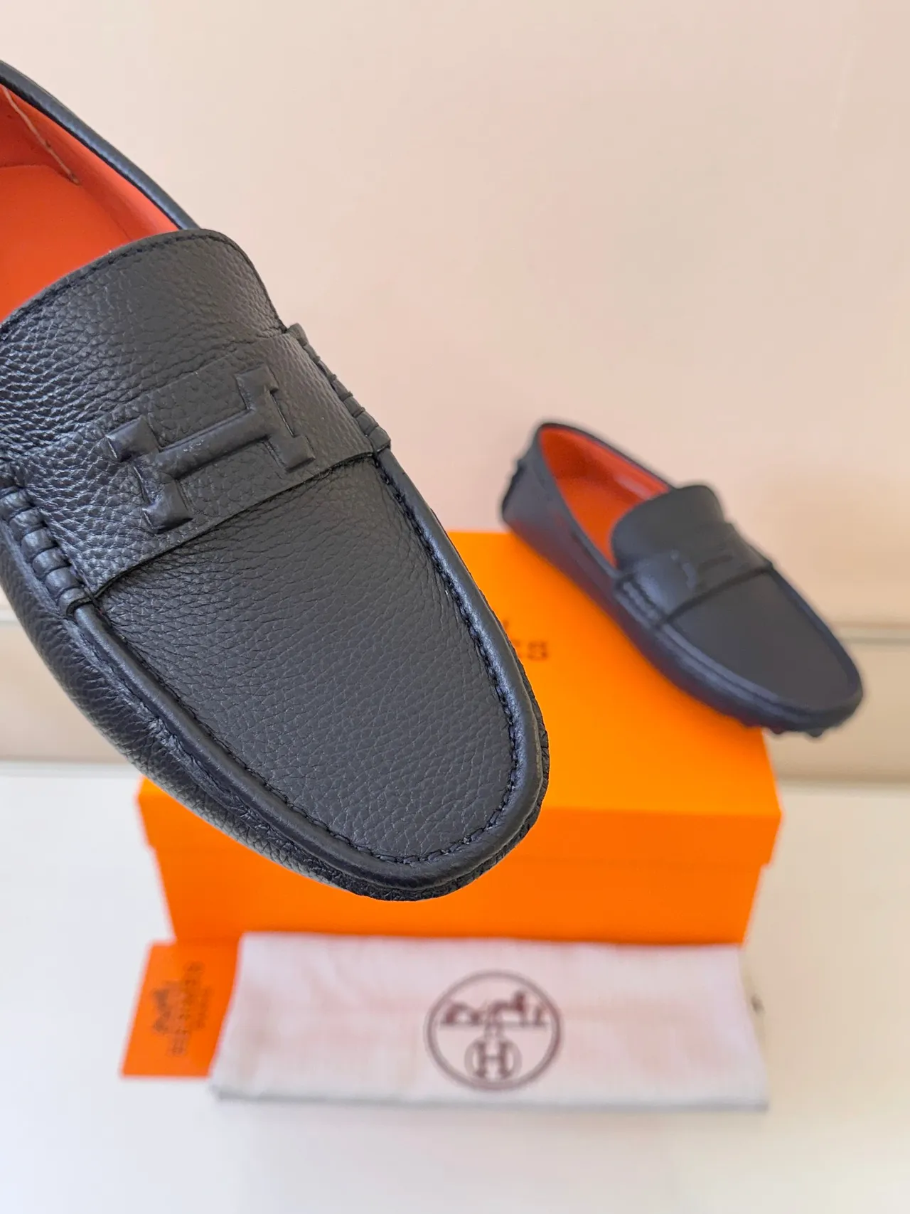 Hermès Oran Black Orange Pebbled Leather Braided Trim Loafer