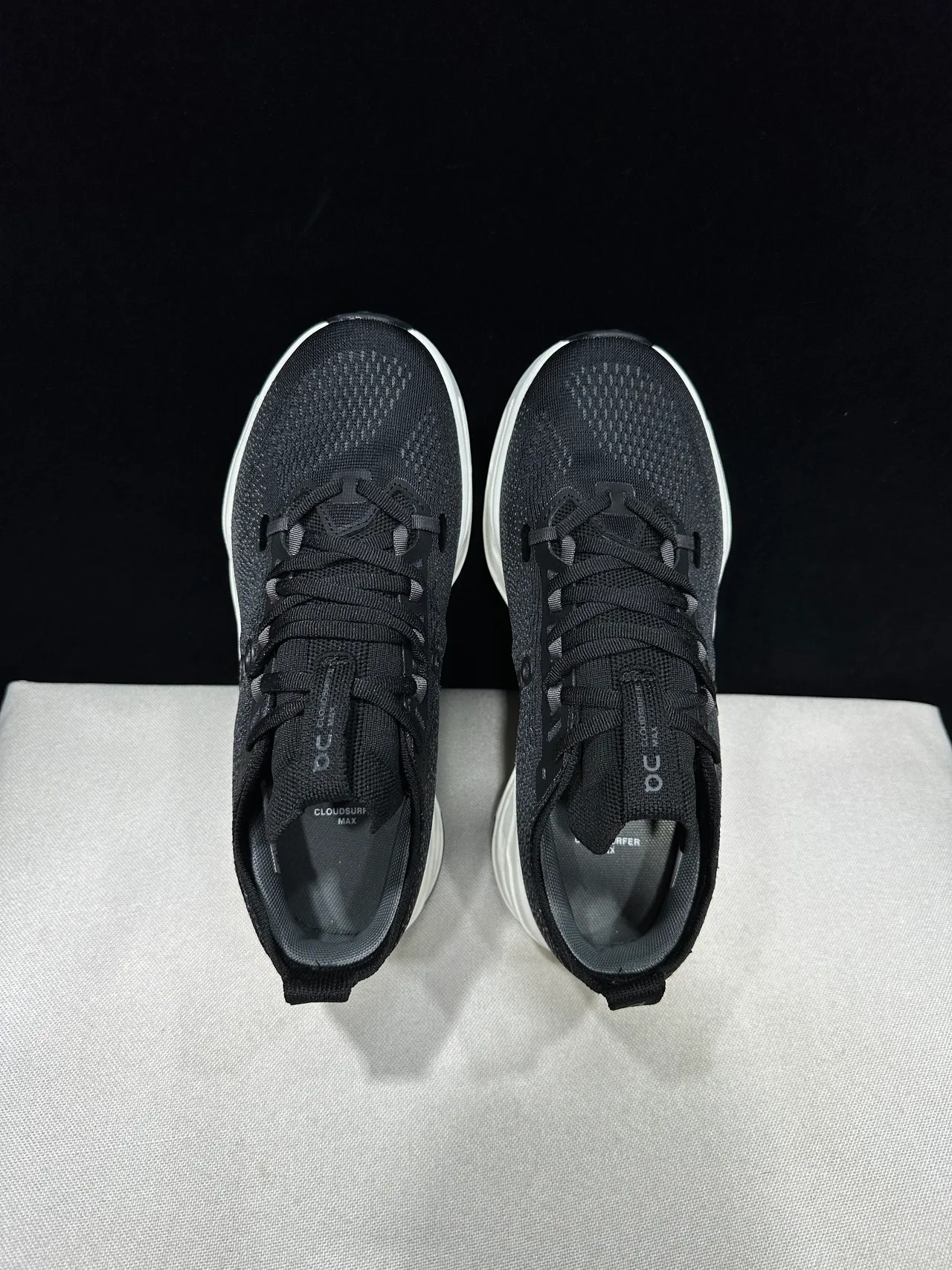 On Cloudmonster Black and Off-White Running Shoes