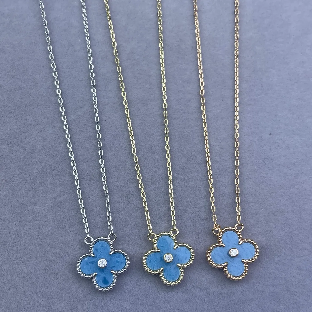 Blue Enamel Four-Petal Flower Pendant Necklace