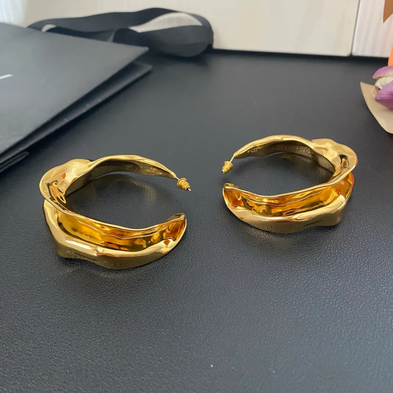 Saint Laurent Twisted Sculptural Gold Hoop Earrings