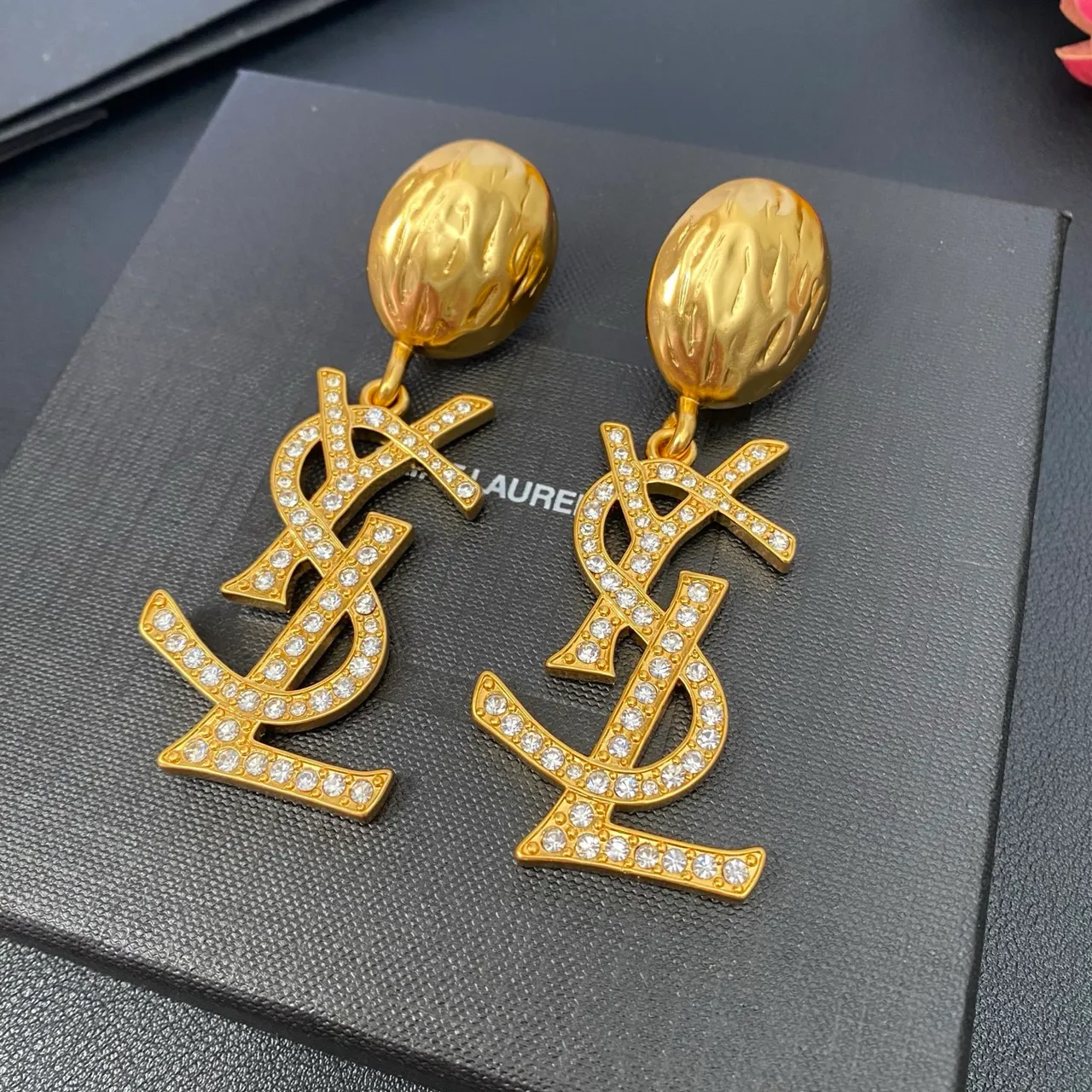 Saint Laurent YSL Monogram Pavé Crystal Gold Dangling Earrings