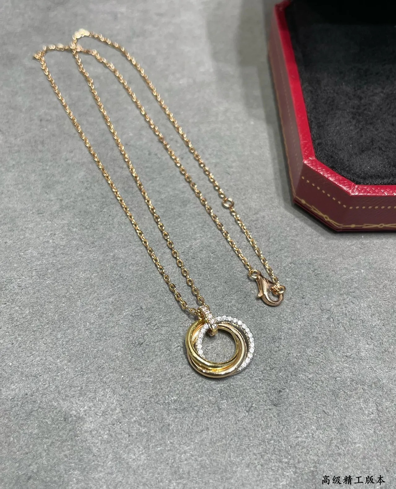 Cartier Gold Black Interlocking Double-Ring Pendant Pavé-Diamond Accent Necklace