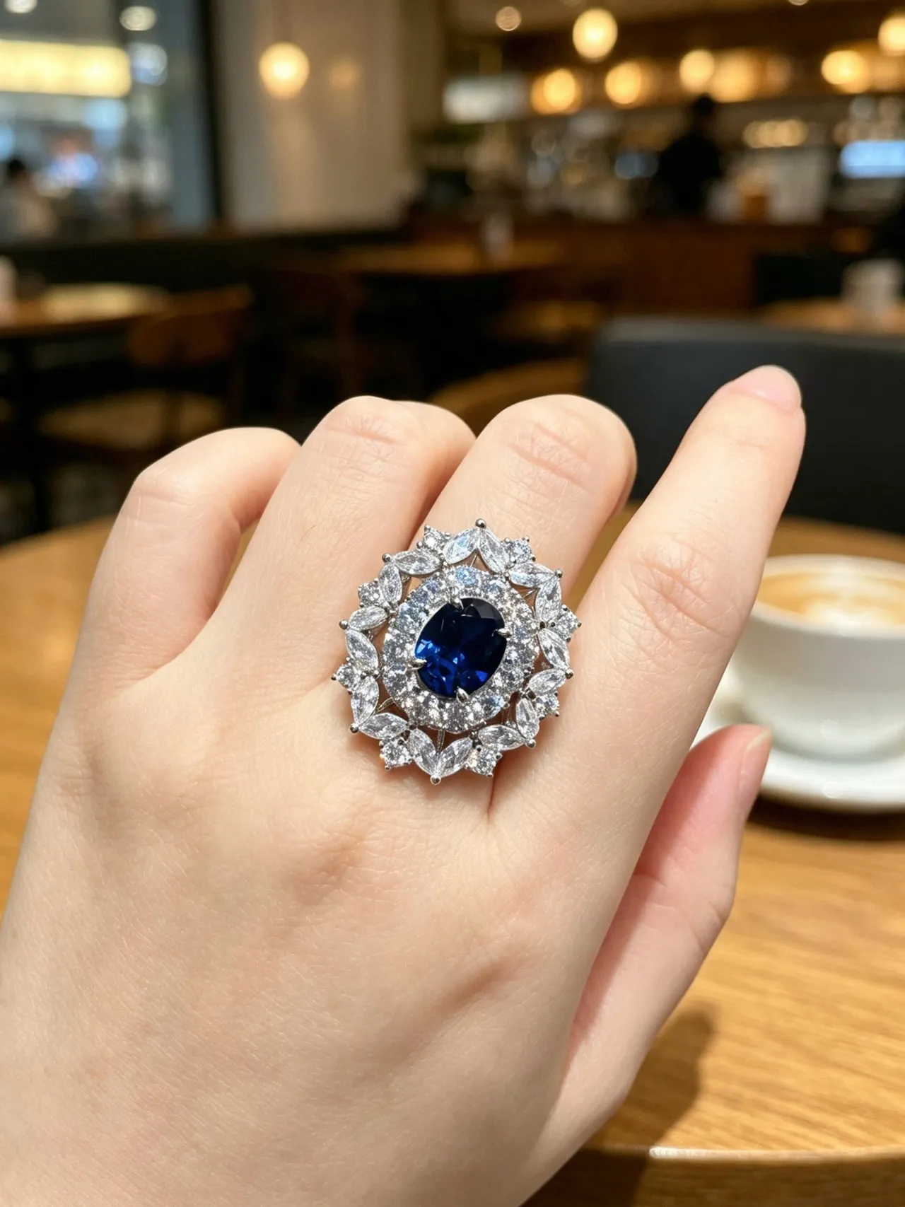 Oval Blue Gem Halo Stud Earrings
