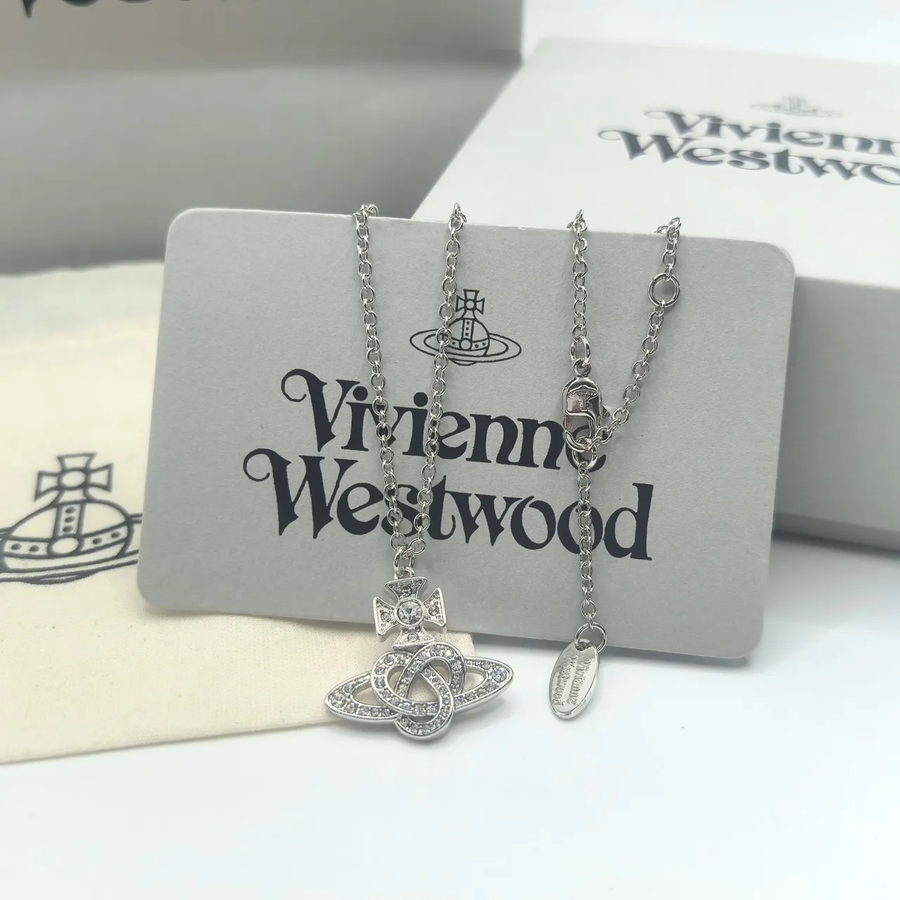 Vivienne Westwood Orb Pendant Necklace Gold and Silver Crystal Necklaces