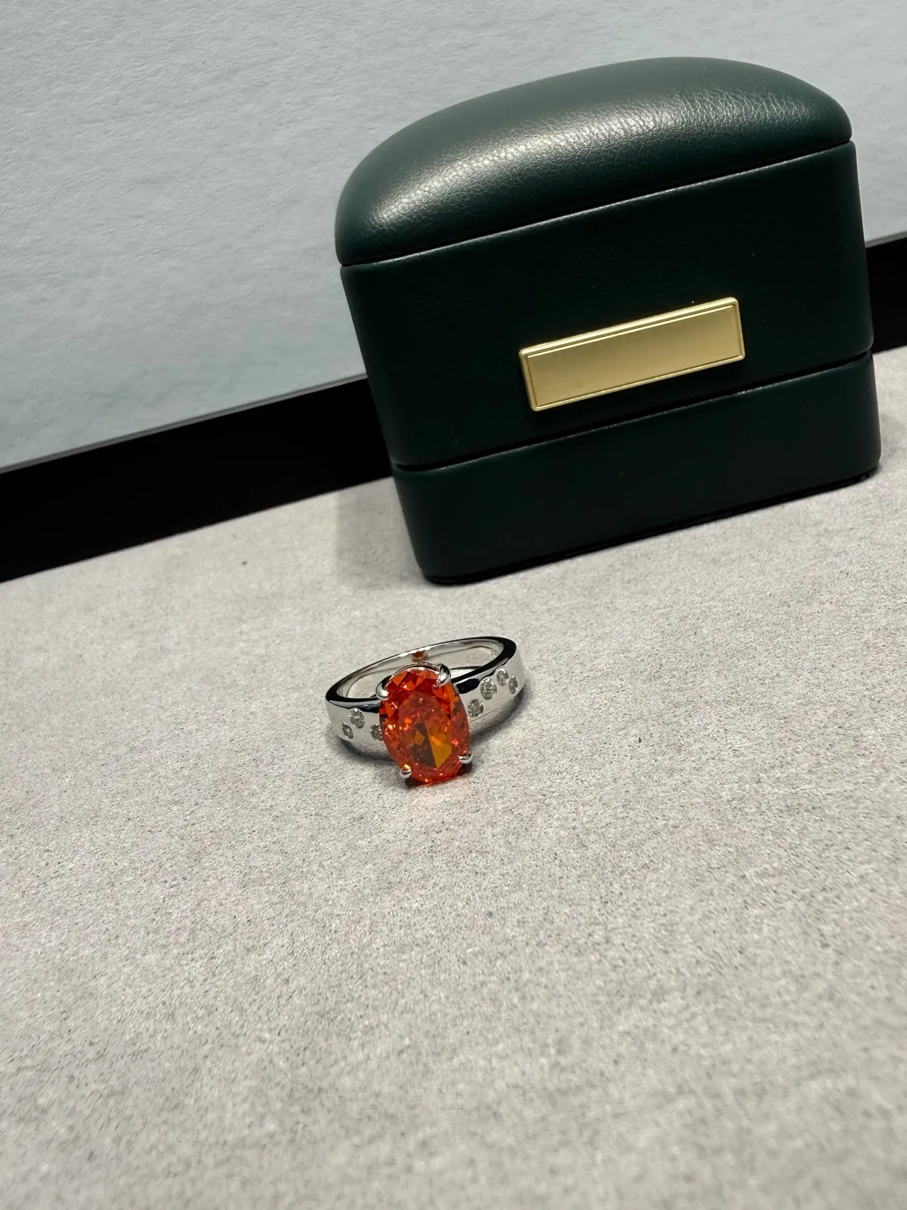 Orange Silver Oval-Cut Center Stone Four-Prong Solitaire Setting Ring