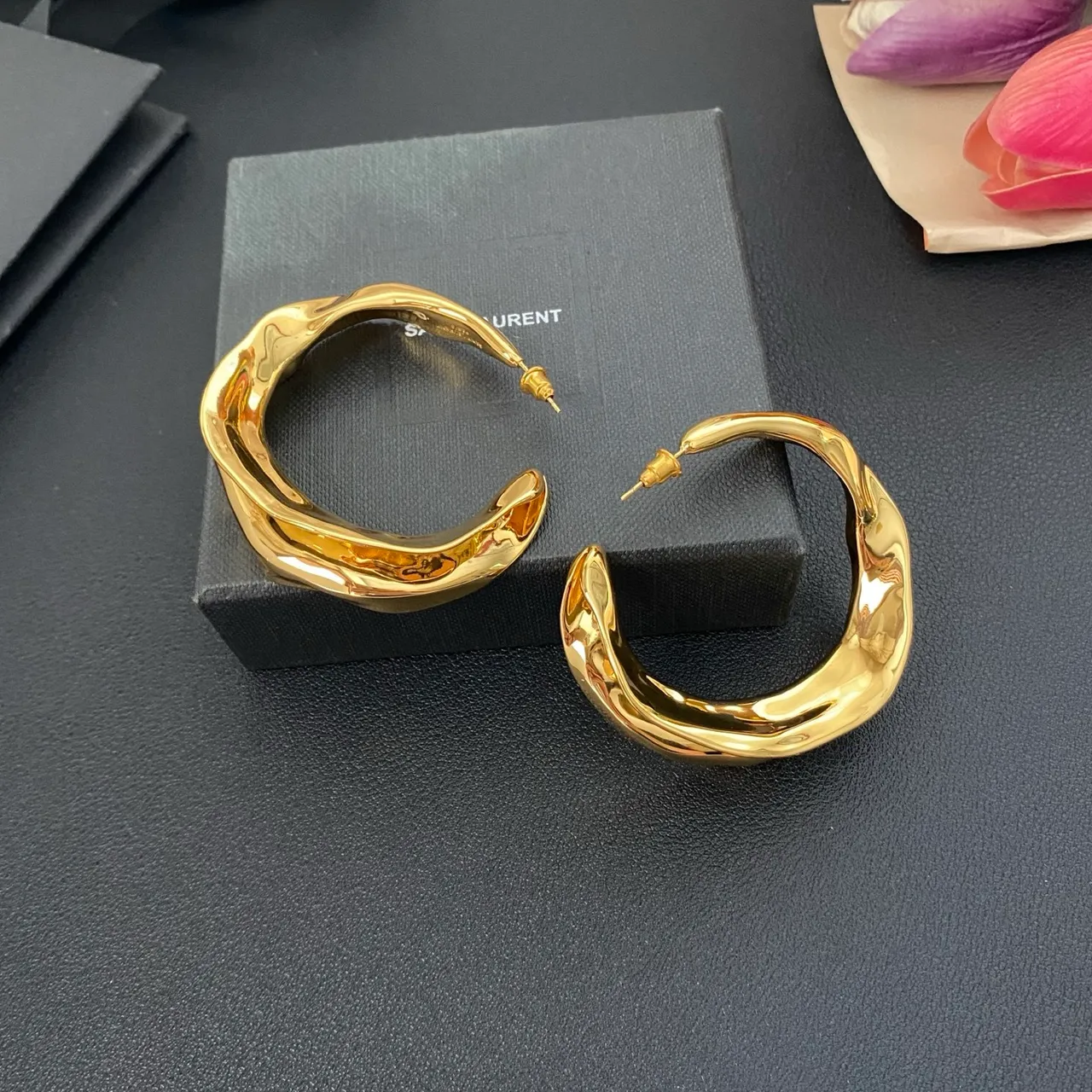 Saint Laurent Twisted Sculptural Gold Hoop Earrings
