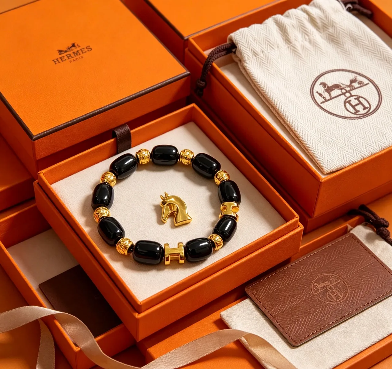 Hermès H and Horsehead Charm Black Gold Onyx-Style Beads Clasp Bracelet