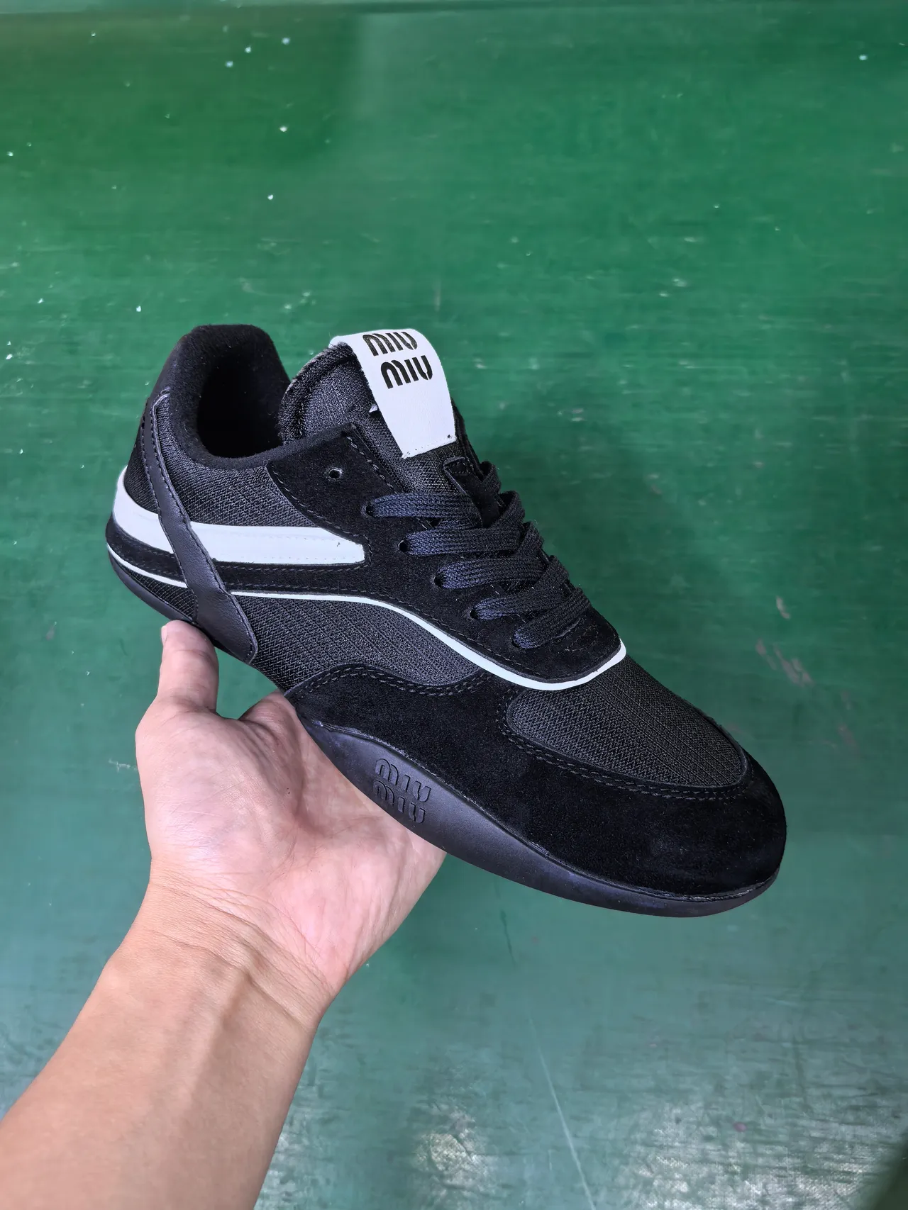 Miu Miu Black and White Stripe Low-Top Lifestyle Sneaker