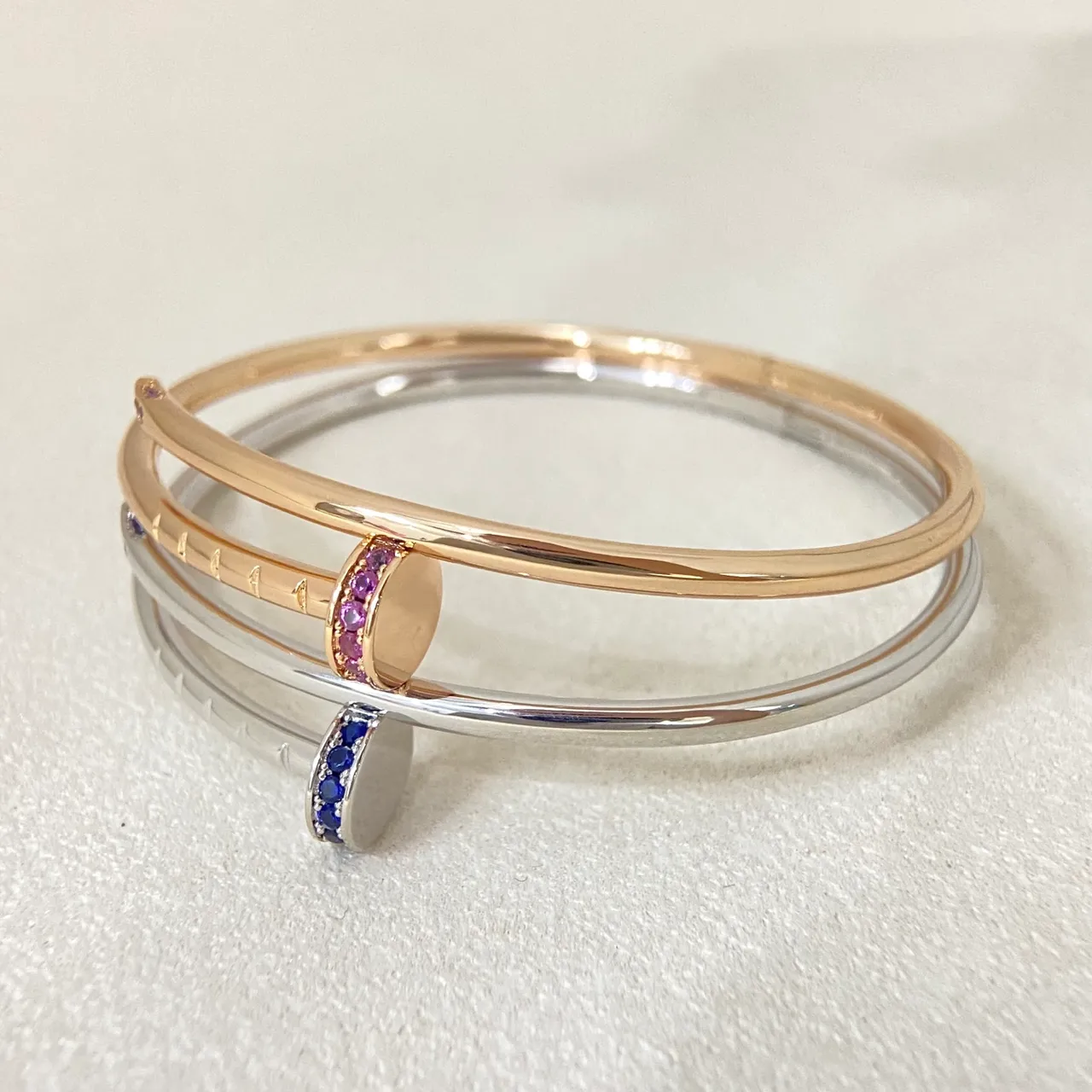 Tiffany & Co. Juste un Clou Blue Sapphire and Pink Sapphire Bangle Bracelets