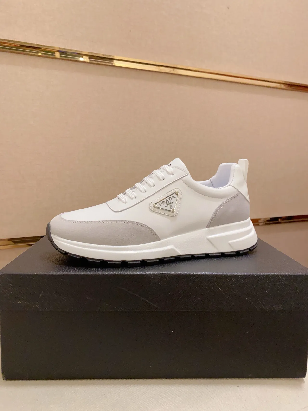 Prada Cloudbust White and Gray Lifestyle Sneakers