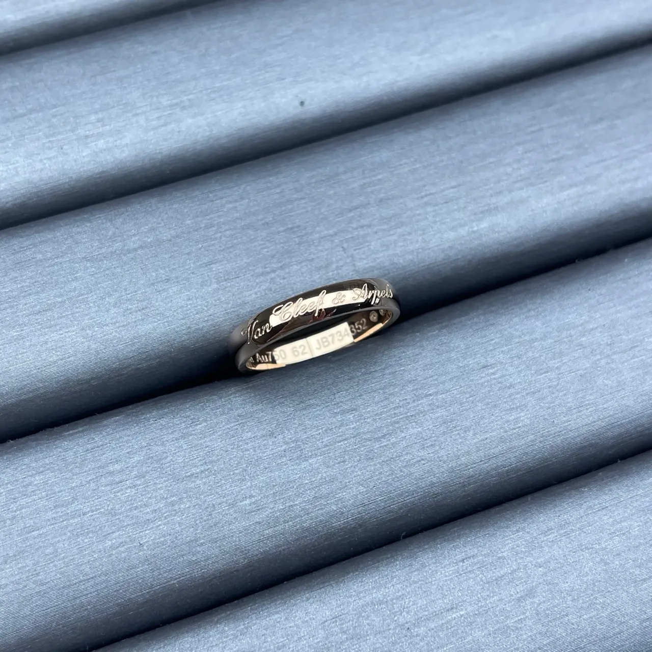 Van Cleef & Arpels Gold Black Engraved Cursive Script Polished Metal Bands Ring