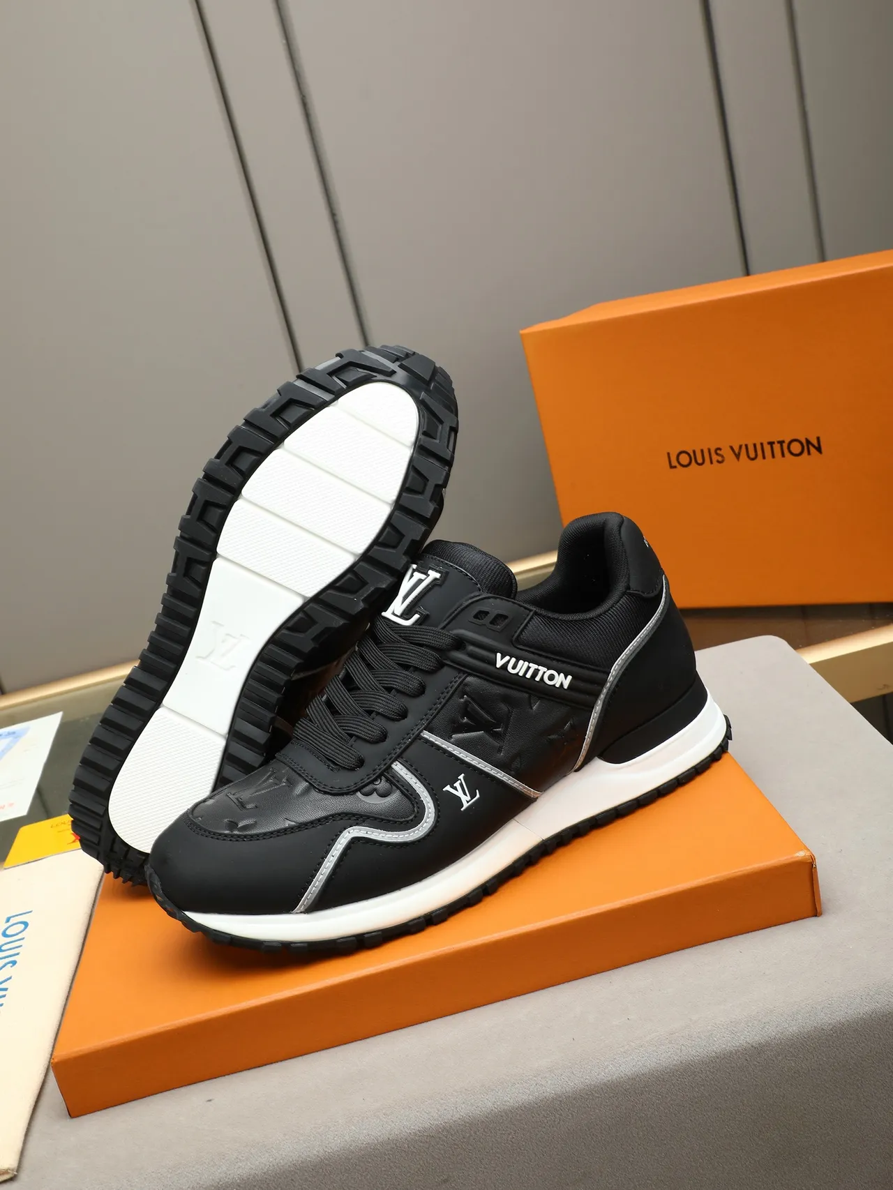Louis Vuitton LV Trainer Black White Leather And Mesh Upper Contrast Midsole Lifestyle Sneakers