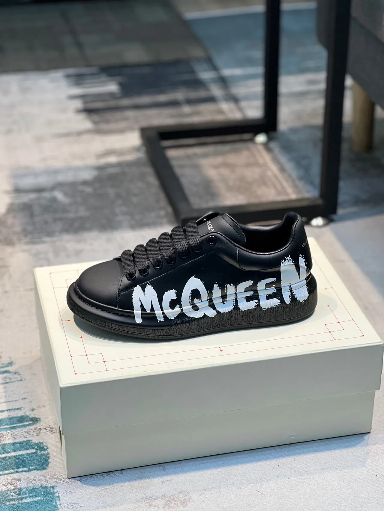 Alexander McQueen Oversized Sneaker Black White Platform Sole Graffiti-Style Logo Lifestyle Sneakers