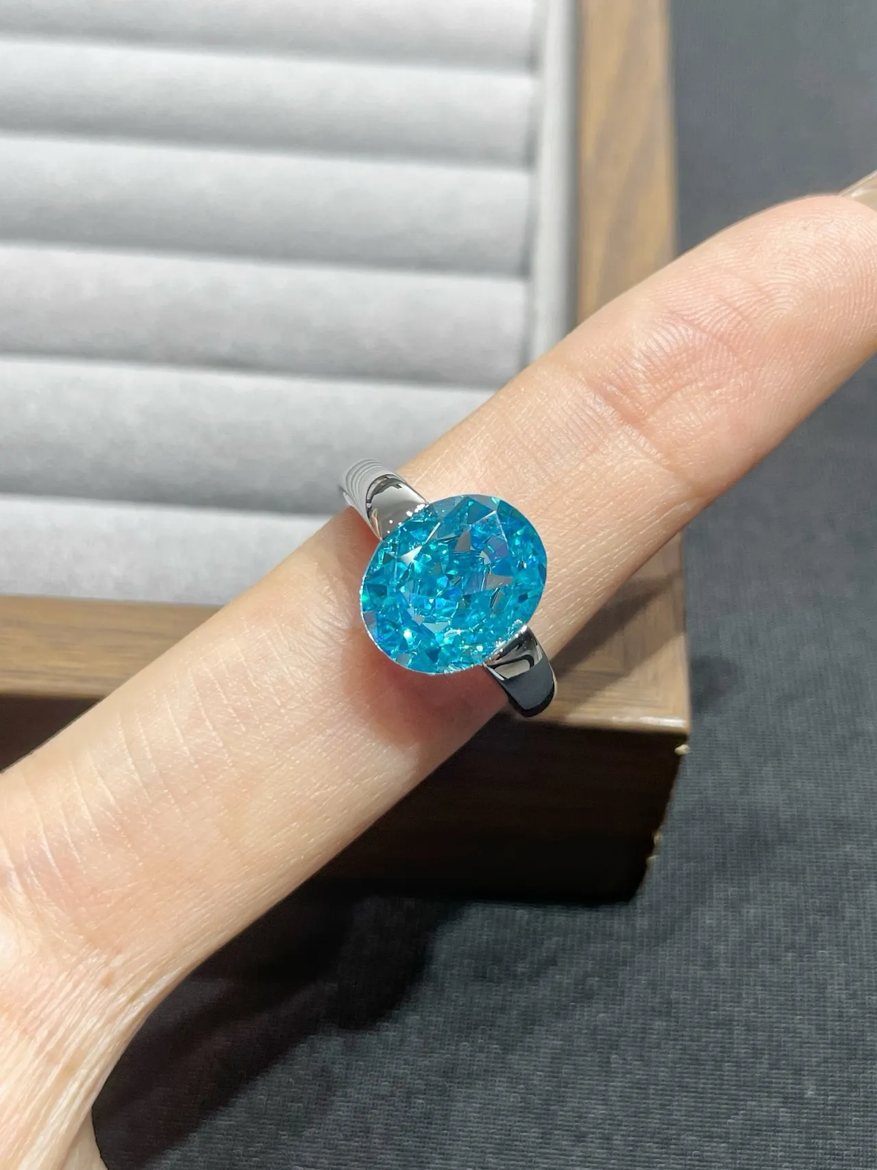 Oval Faceted Blue Gemstone Split Shank Ring