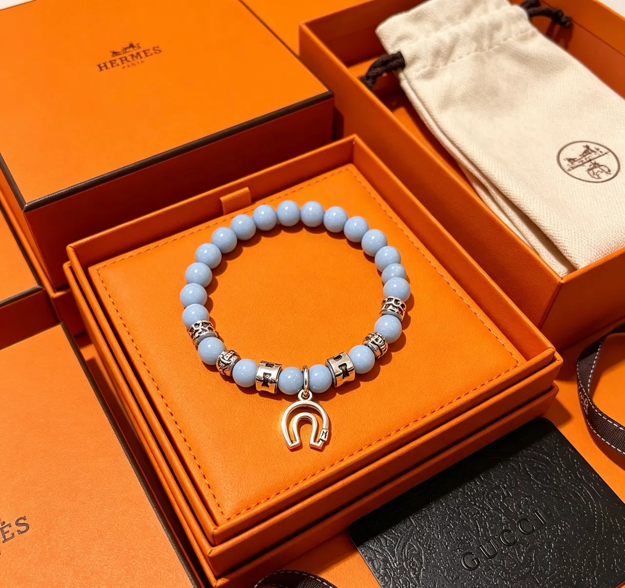 Gucci Beaded Light Blue Stone and Silver-Tone Horseshoe Charm Bracelet
