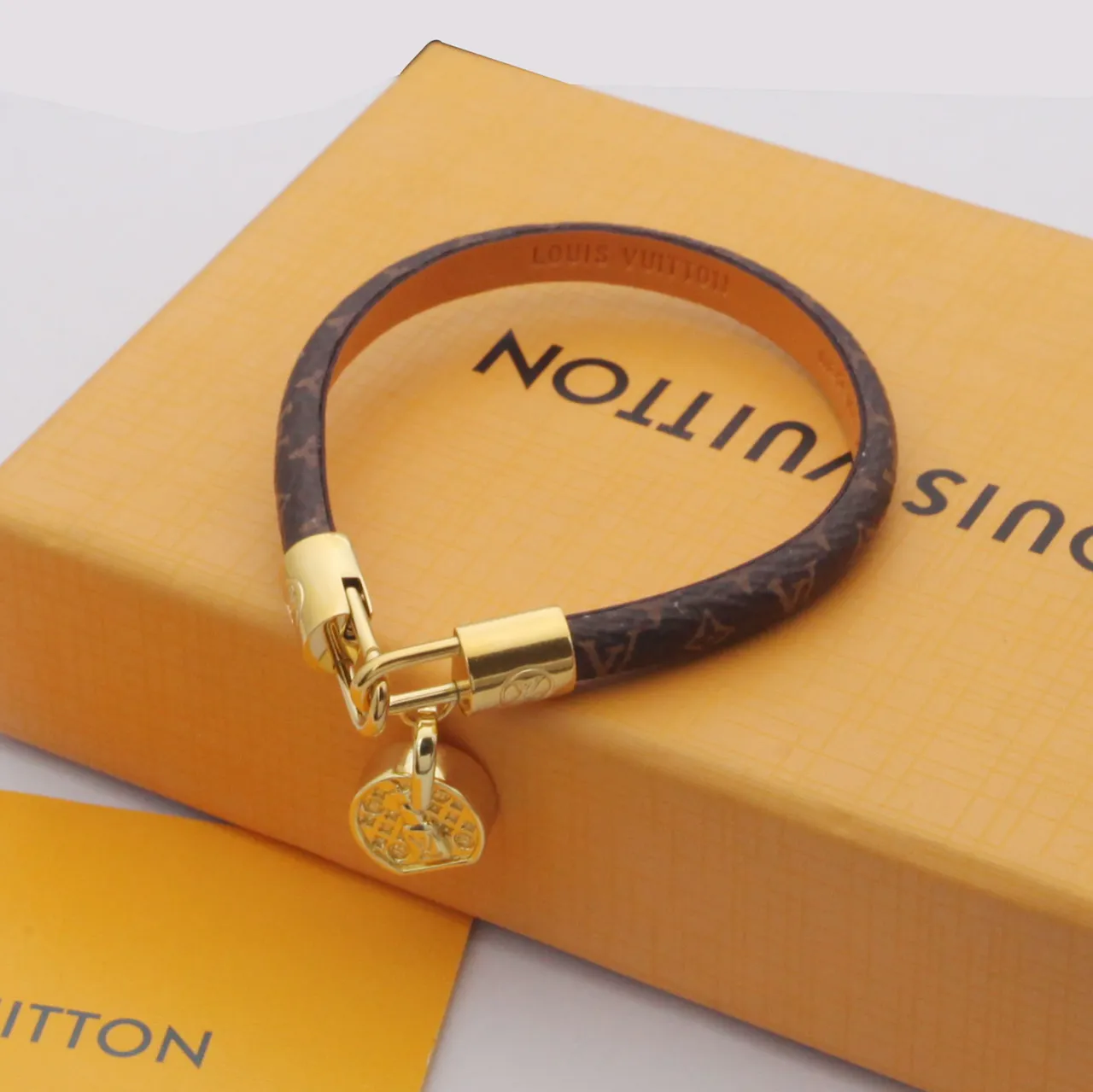 Louis Vuitton Brown Gold Monogram-Coated Leather Hardware Handbag