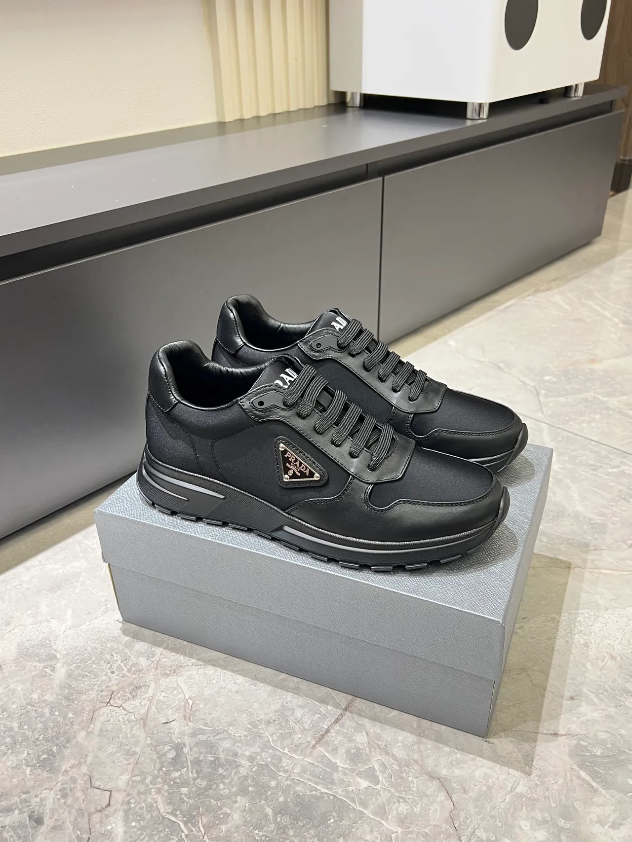 Prada Black Gray Leather And Textile Upper Metallic Triangle Logo Plaque Lifestyle Sneakers