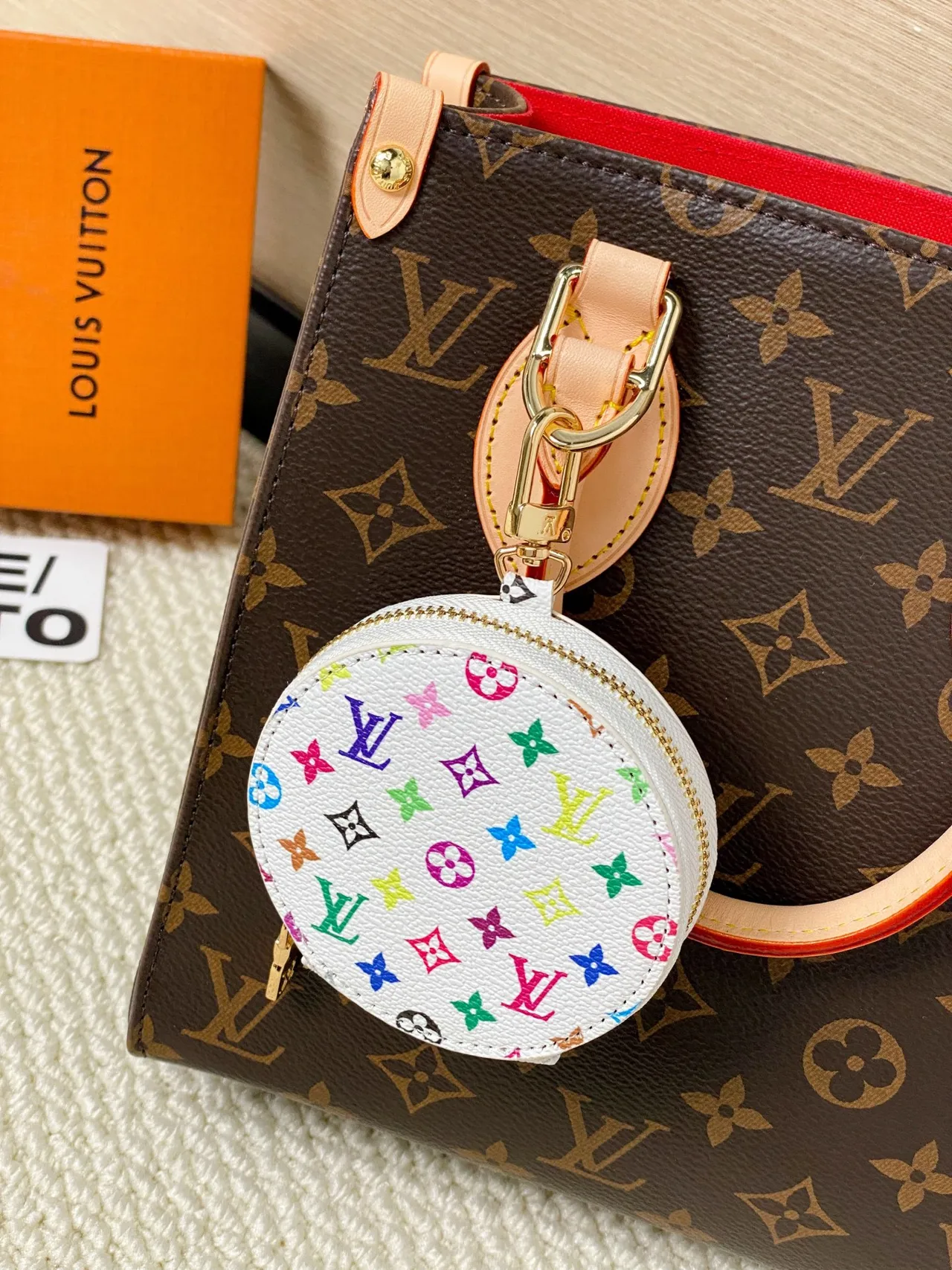 Louis Vuitton Multicolor Brown Circular Zippered Coin Purse