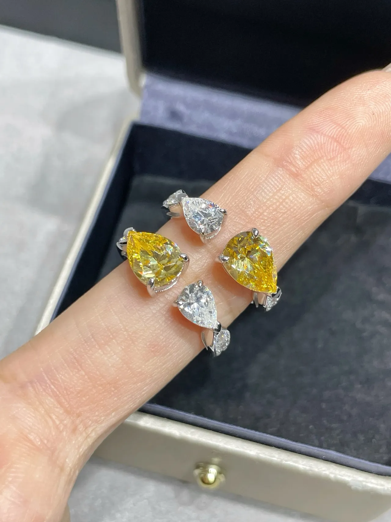 Yellow and Clear Pear-Cut Dual-Stone Asymmetrical Rings