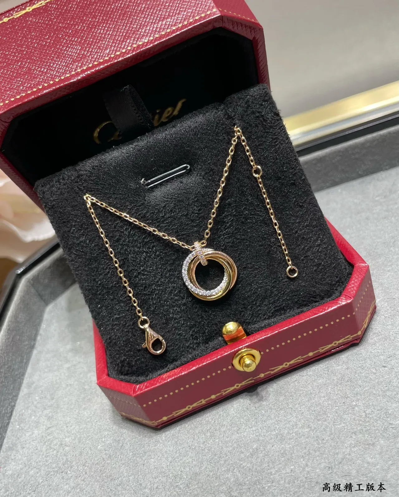 Cartier Gold Black Interlocking Double-Ring Pendant Pavé-Diamond Accent Necklace