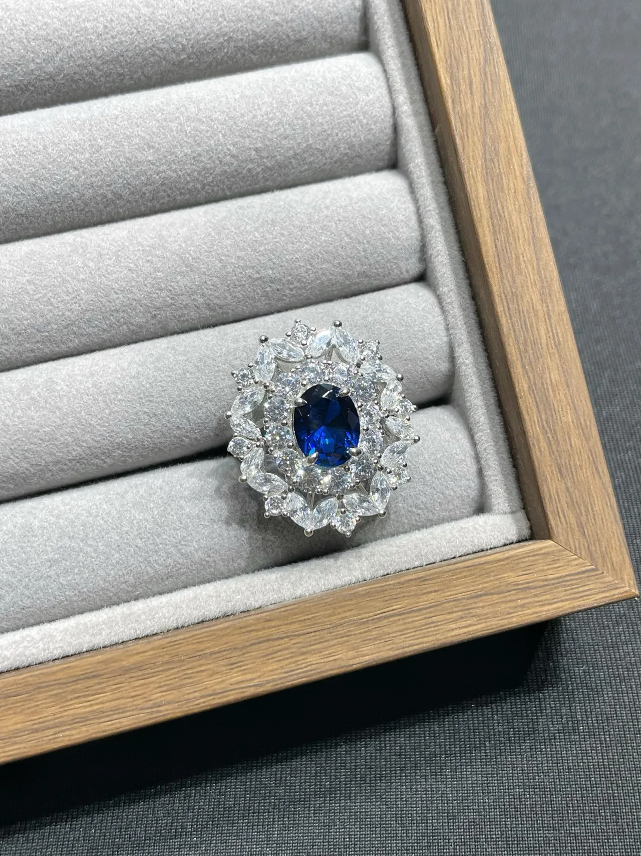 Oval Blue Gem Halo Stud Earrings