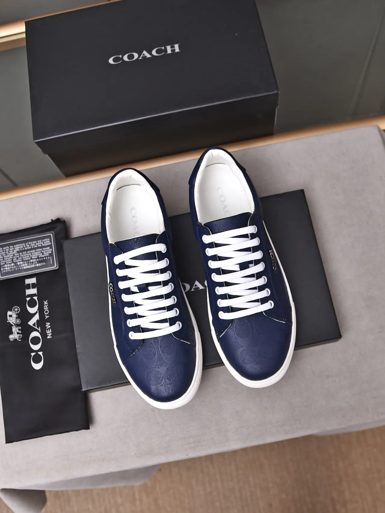 Coach Navy Embossed Signature Leather Low-Top Sneakers