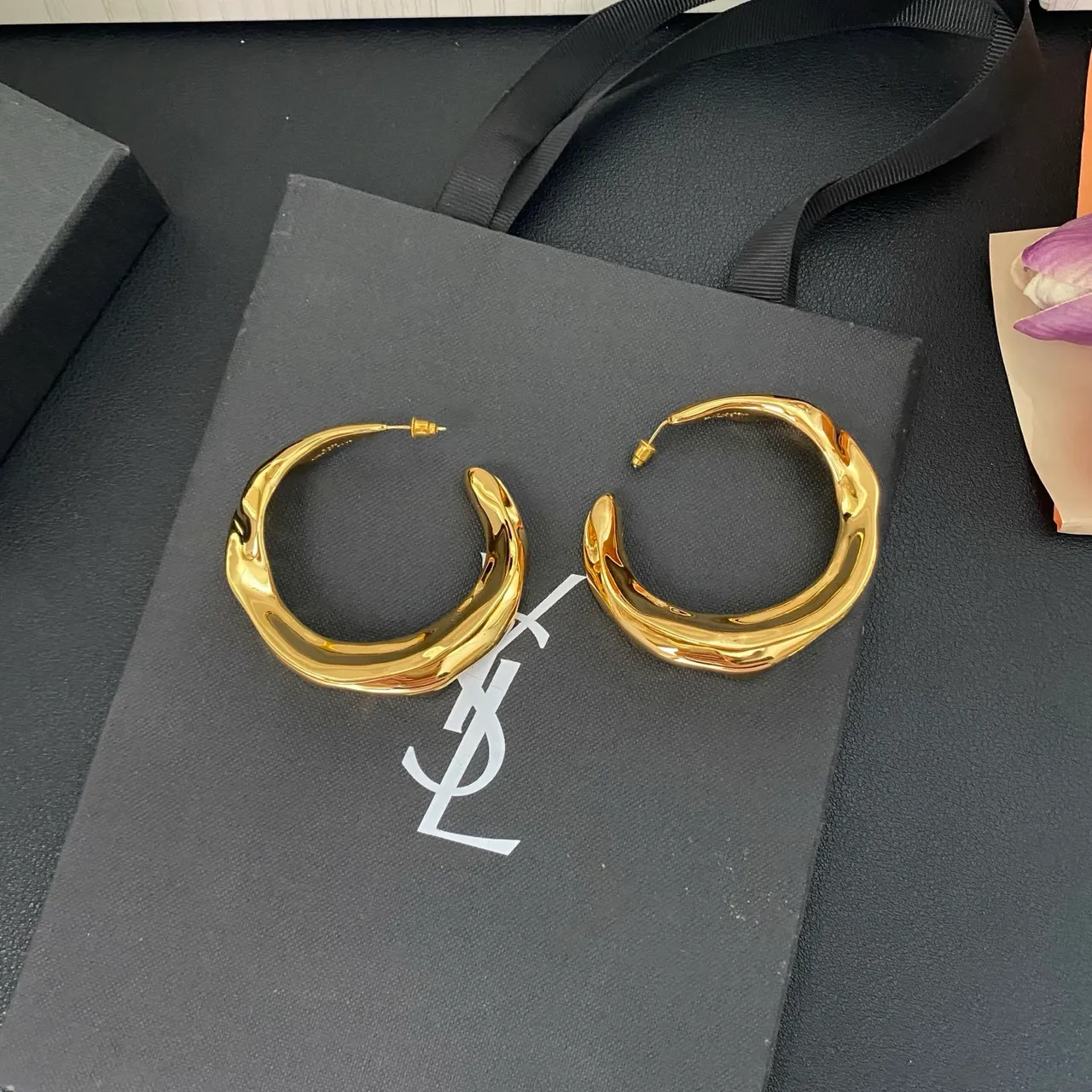 Saint Laurent Twisted Sculptural Gold Hoop Earrings