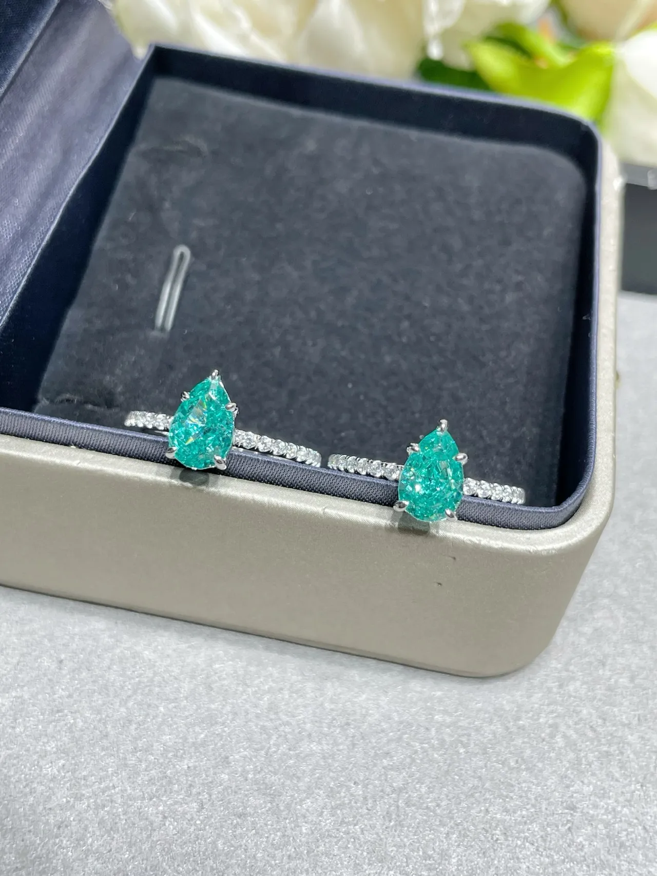 Pear-Shaped Green Gemstone Pavé Diamond Ring