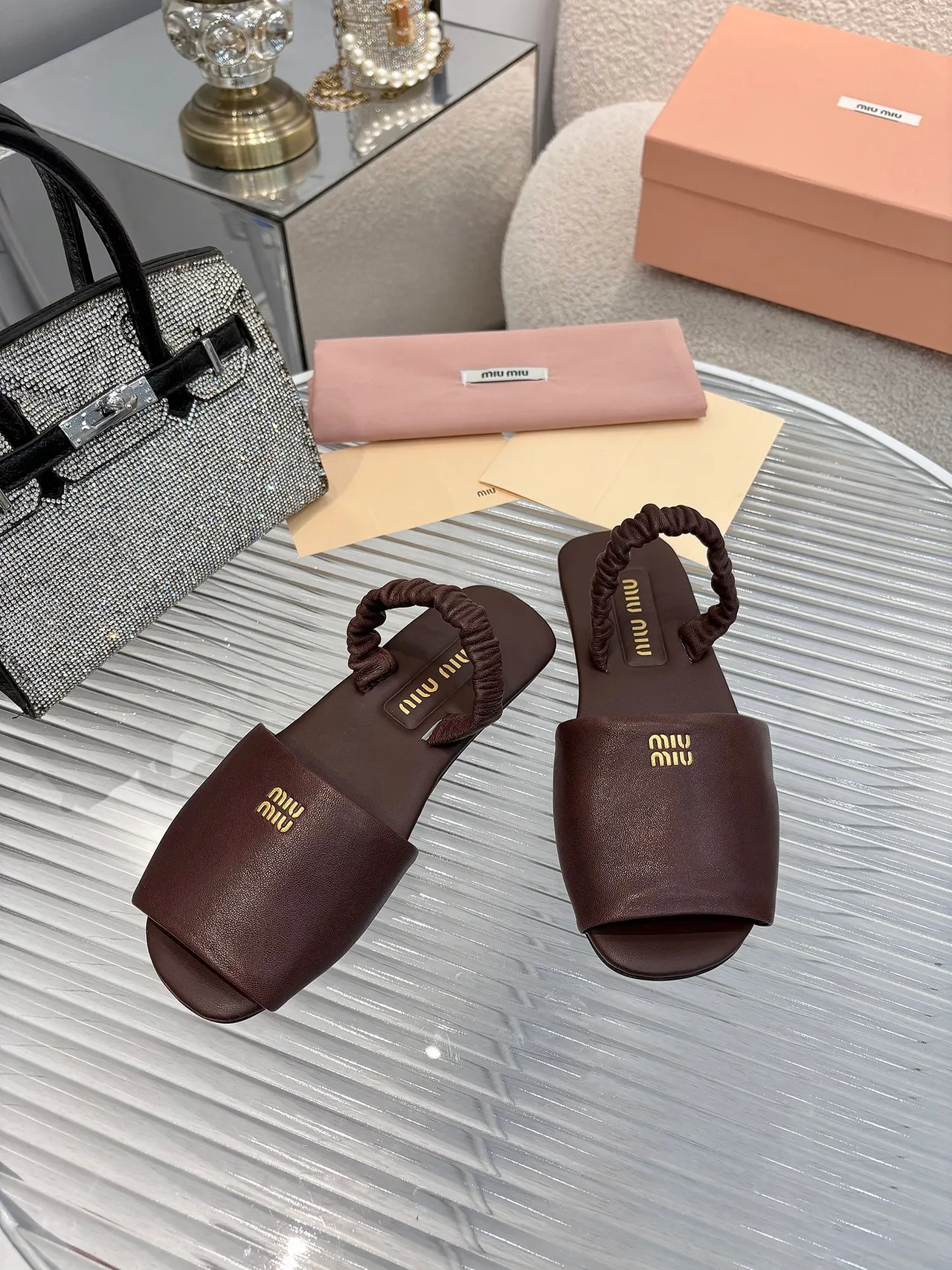 Miu Miu Black Gold Ruched Knotted Strap Logo Plaque Slippers