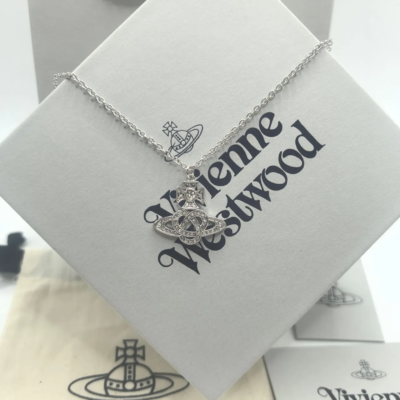 Vivienne Westwood Orb Pendant Necklace Gold and Silver Crystal Necklaces