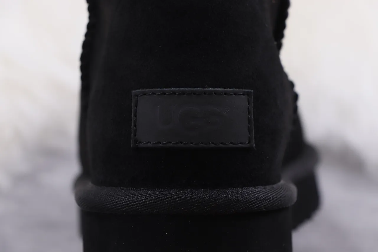 UGG Classic Tall Black Suede Shearling-Lined Knee Boots