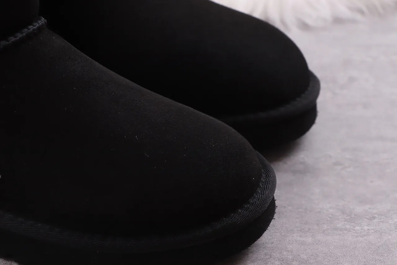 UGG Classic Tall Black Suede Shearling-Lined Knee Boots
