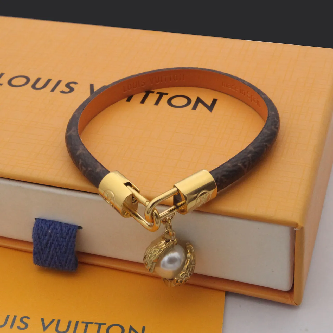 Louis Vuitton Brown Gold Monogram-Coated Leather Hardware Handbag