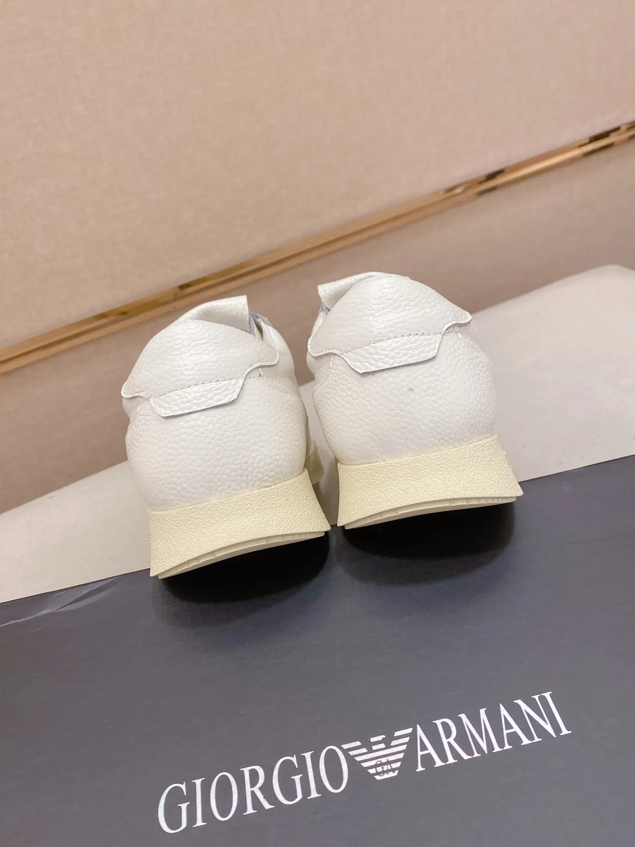 Emporio Armani White Beige Pebbled Leather Upper Gold Branding Sneakers