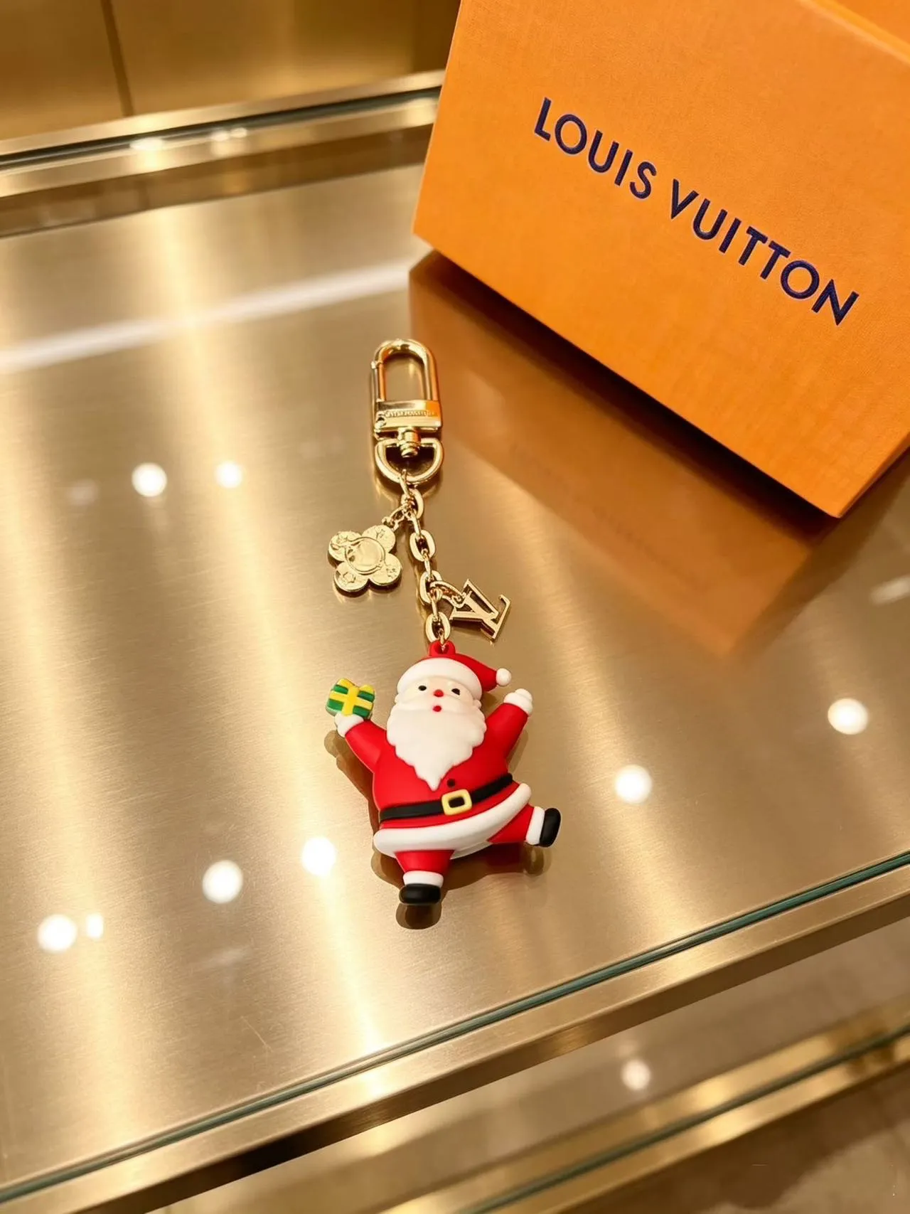 Louis Vuitton Multicolor Gold Resin Holiday Figurines Hardware Phone Accessory