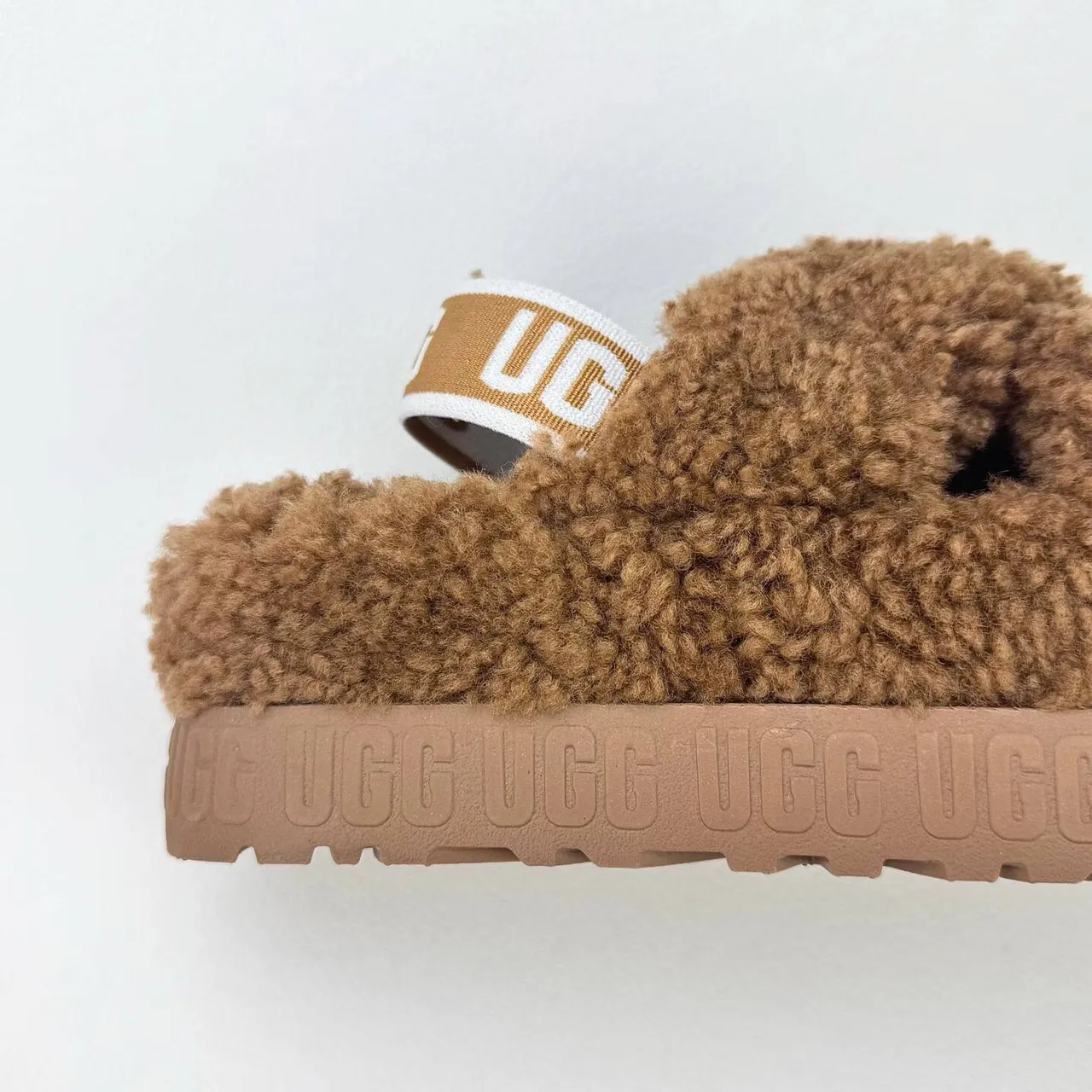UGG Tasman Brown Fuzzy Cross-Strap Platform Slippers