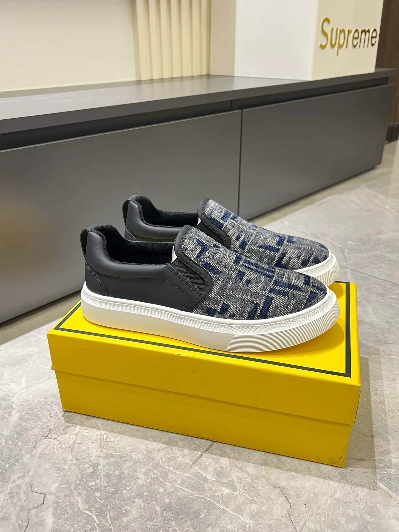 Supreme Slip-On Patterned Knit and Leather Lifestyle Sneakers