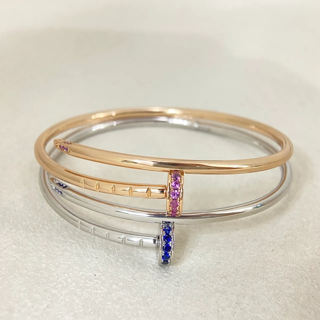 Tiffany & Co. Juste un Clou Blue Sapphire and Pink Sapphire Bangle Bracelets