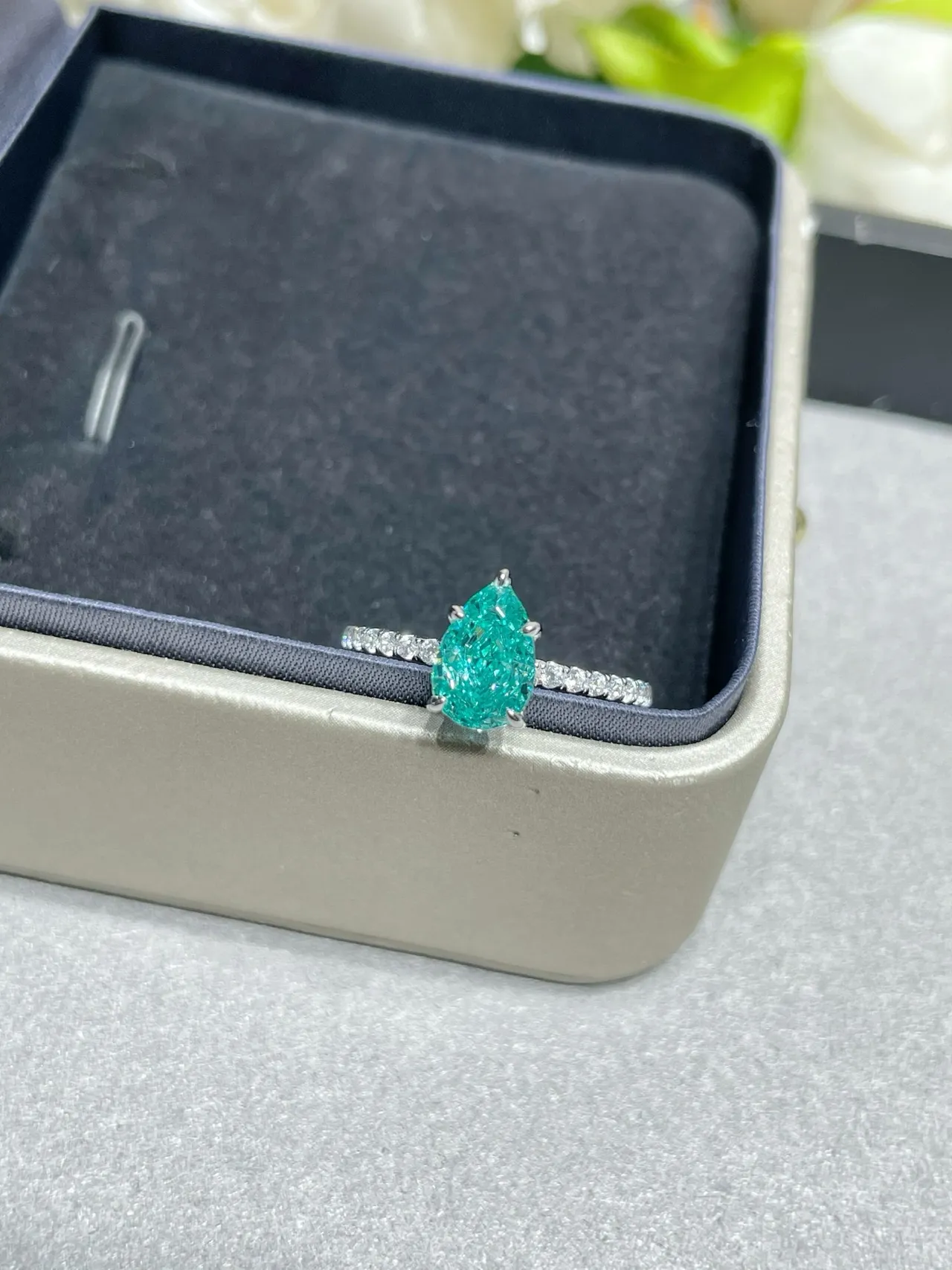 Pear-Shaped Green Gemstone Pavé Diamond Ring