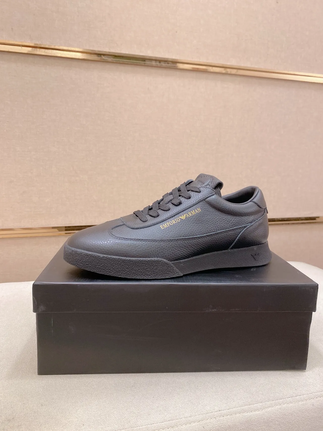 Emporio Armani Pebbled Leather Gold-Branded Low-Top Sneaker