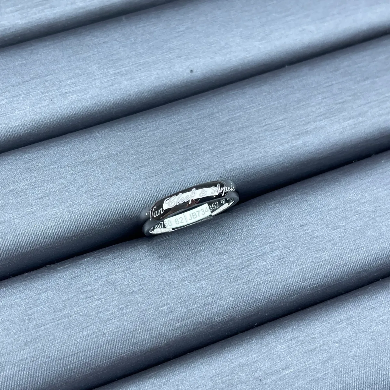 Van Cleef & Arpels Gold Black Engraved Cursive Script Polished Metal Bands Ring