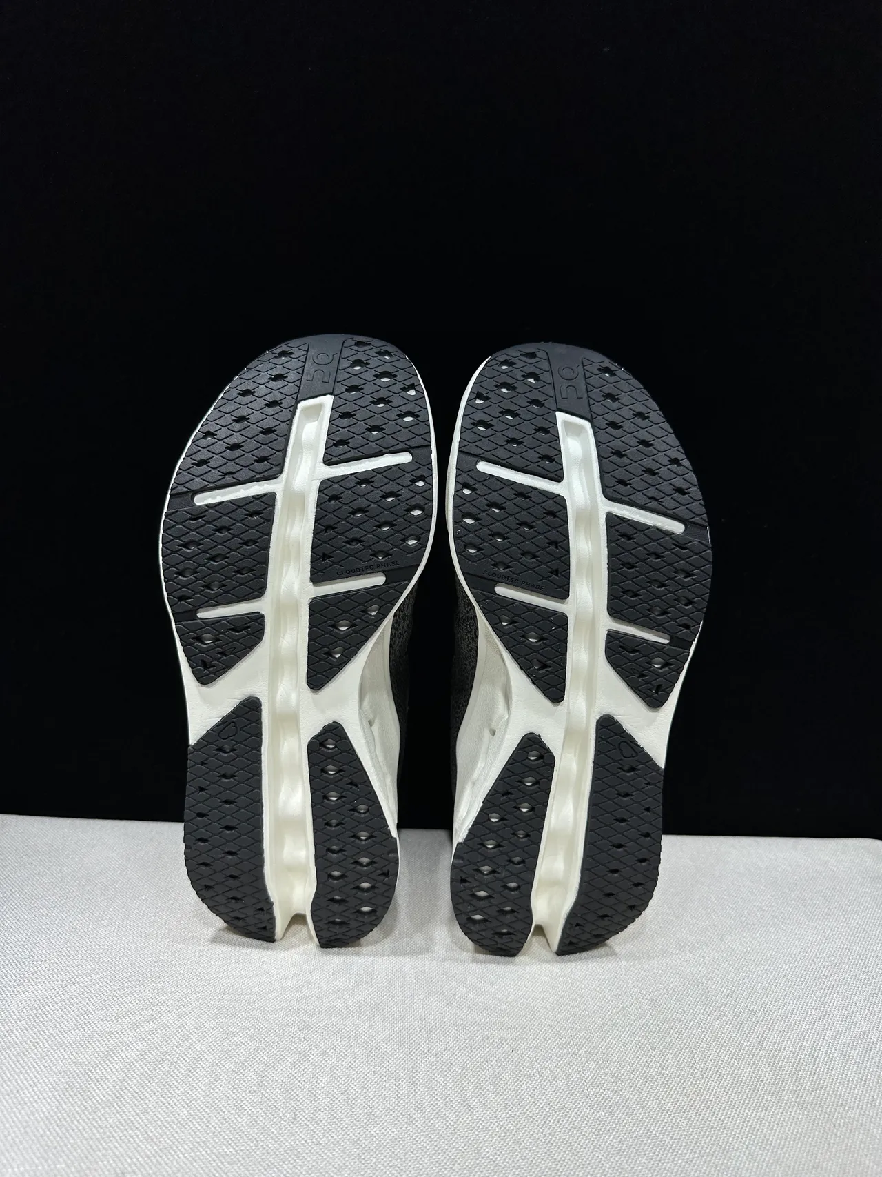On Cloudmonster Black and Off-White Running Shoes